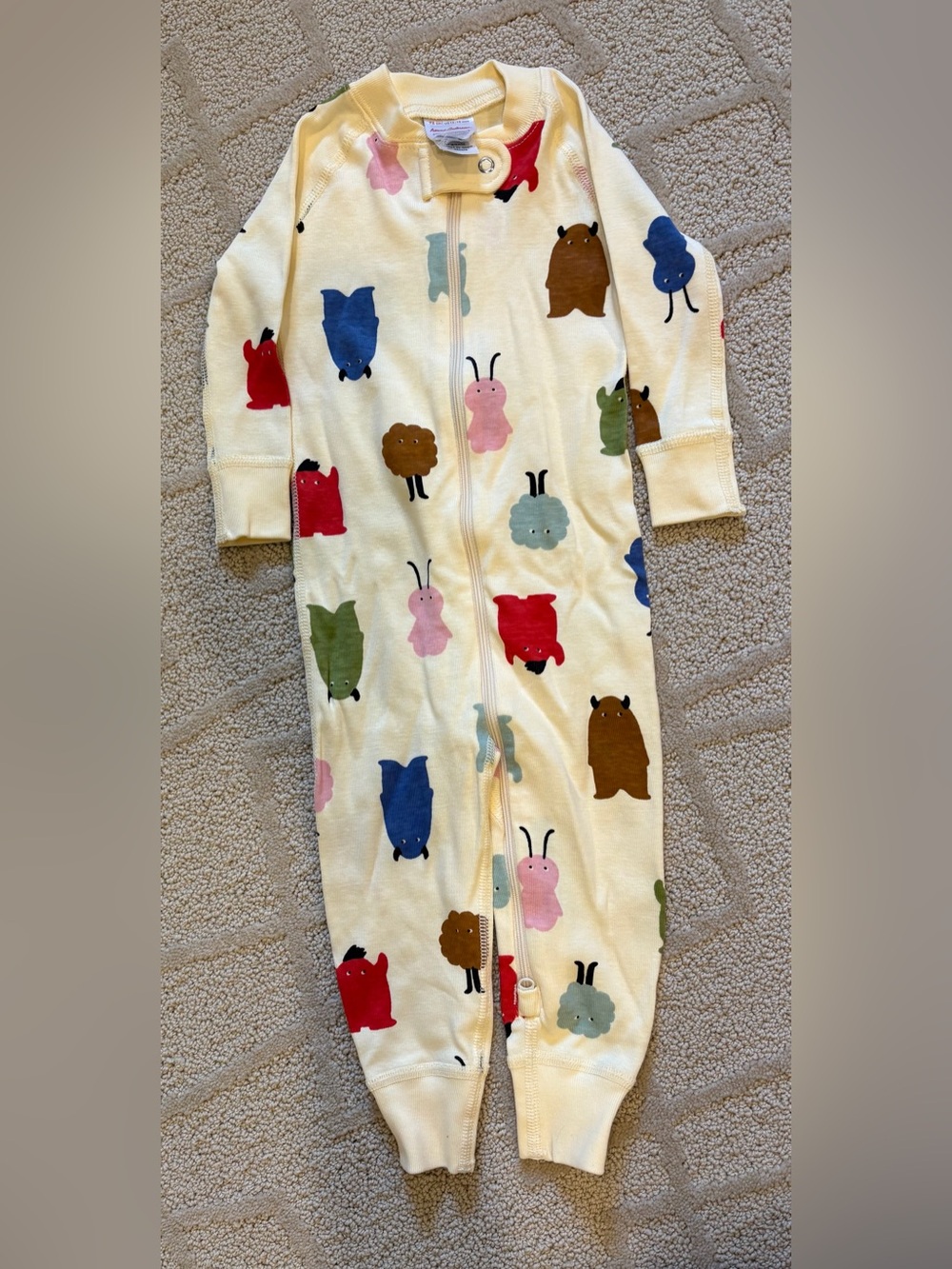 Hanna Andersson Cream Zip Pajamas with Multicolor Monster Print